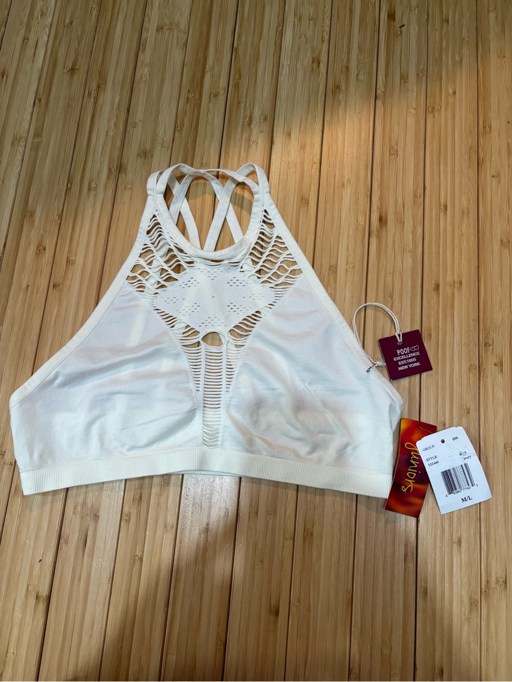 Poof brand ivory laser-cut cross-back bralette. Size M/L. NWT.
